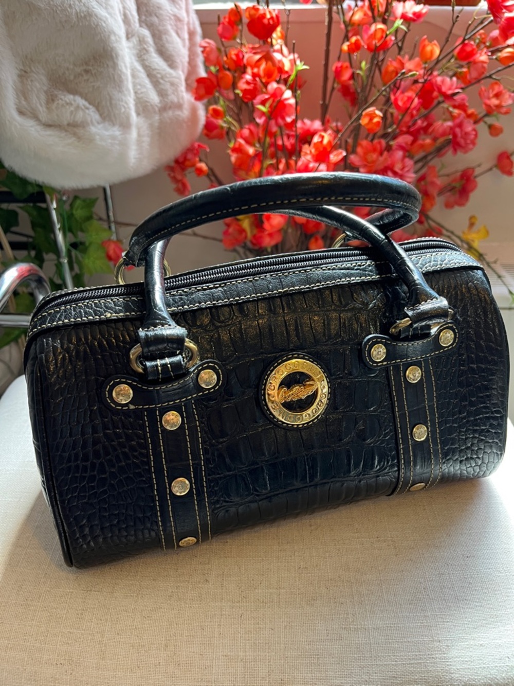 Black Croc-Embossed Mini Barrel Bag with Gold Medallion Accent